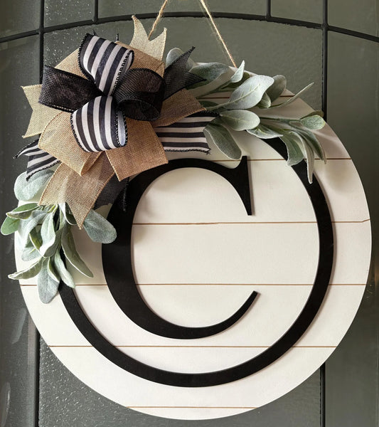 Initial Front Door Sign